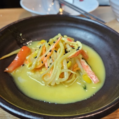 Sweet-and-sour bean-sprout cold salad banchan at Jeonganjeong
