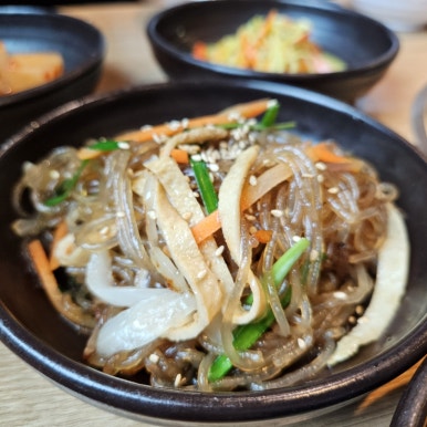 Japchae (Korean glass-noodle stir-fry) banchan at Jeonganjeong