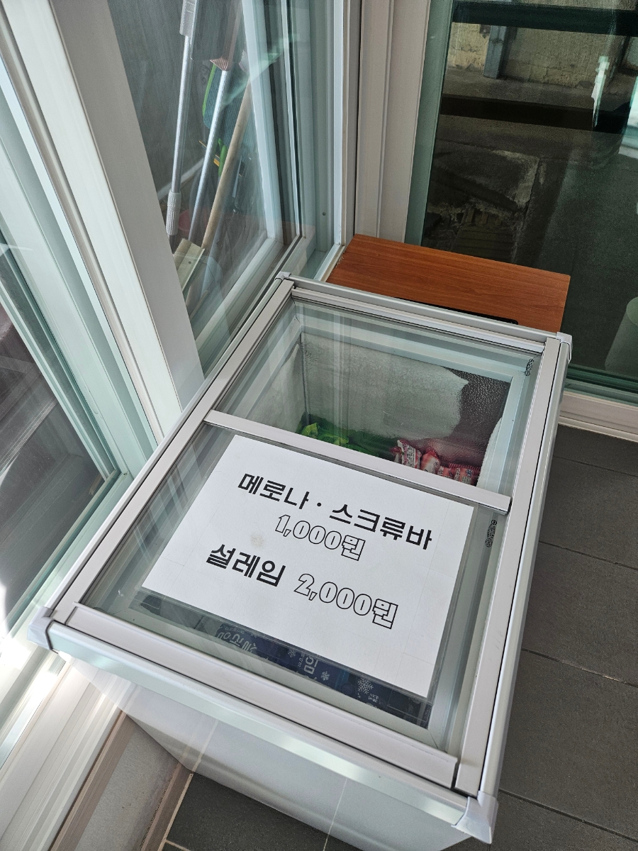 Freezer with Korean ice pops Melona and Screw Bar at the entrance