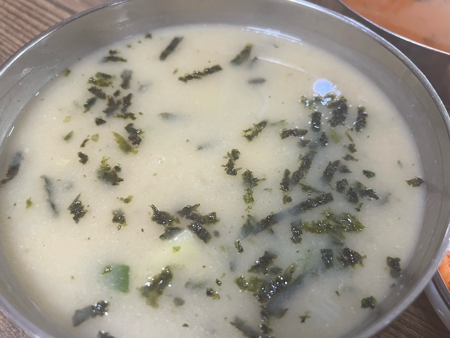 Plain sujebi in a creamy perilla-seed broth with seaweed flakes