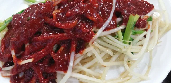 Tangy pufferfish skin salad at Jinhwa Bokguk