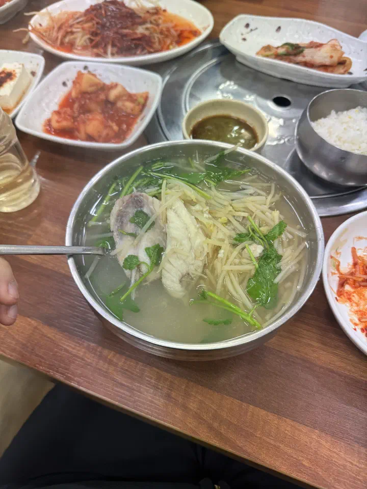 Full table setting with pufferfish jiri at Jinhwa Bokguk