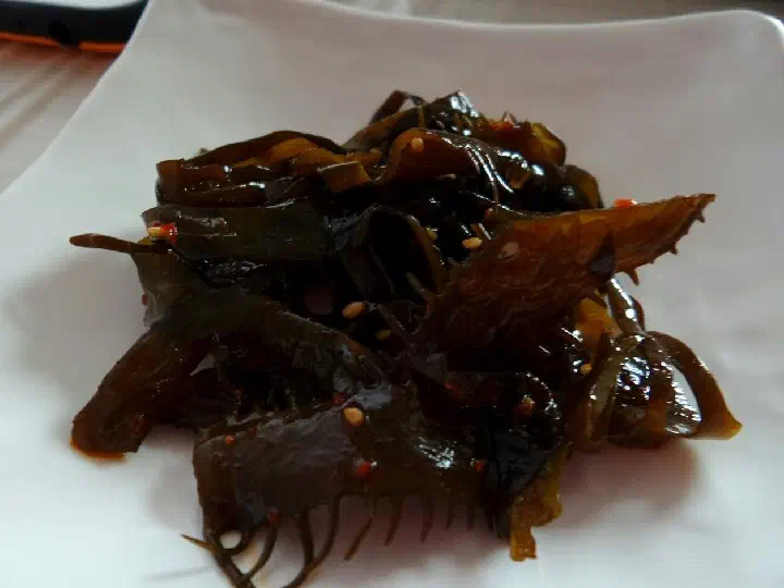 Braised abalone innards and seaweed side dishes at Yukil Hoetjip