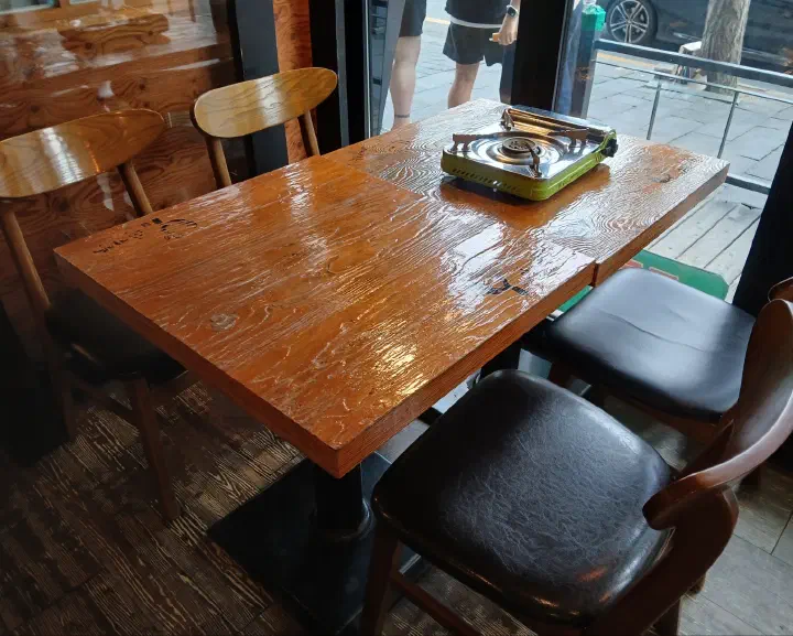 Interior and window table seating at Saengsaeng-gui Saengsaeng