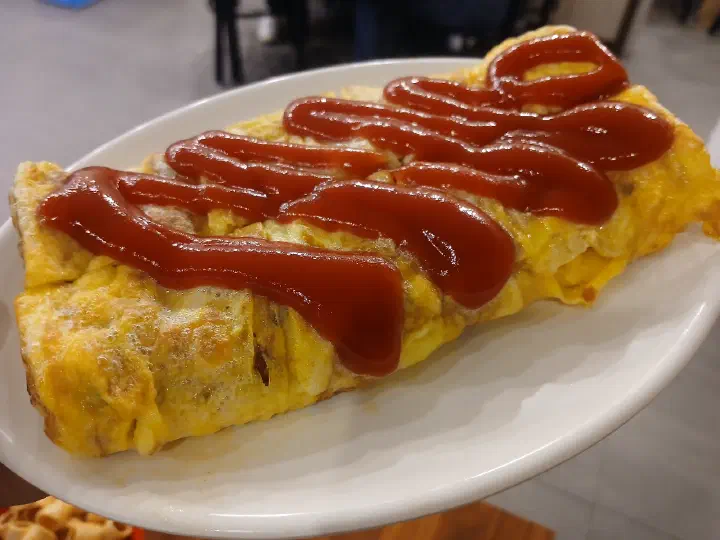 Signature rolled omelette gyeranmari at Saengsaeng-gui Saengsaeng