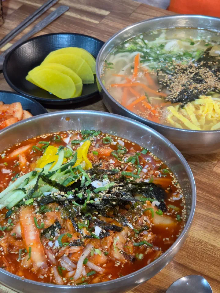 Two bowls: bibim kalguksu and cold kalguksu