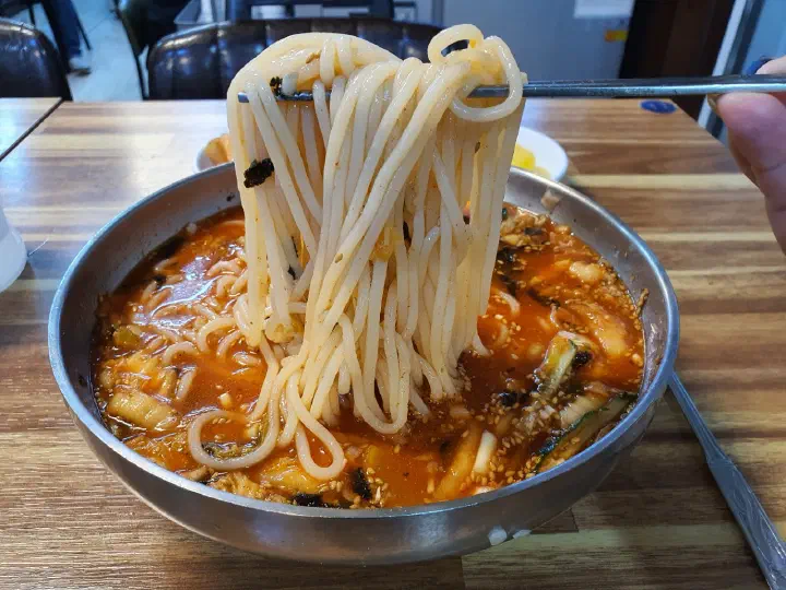 Chewy noodles lifted from cold kalguksu