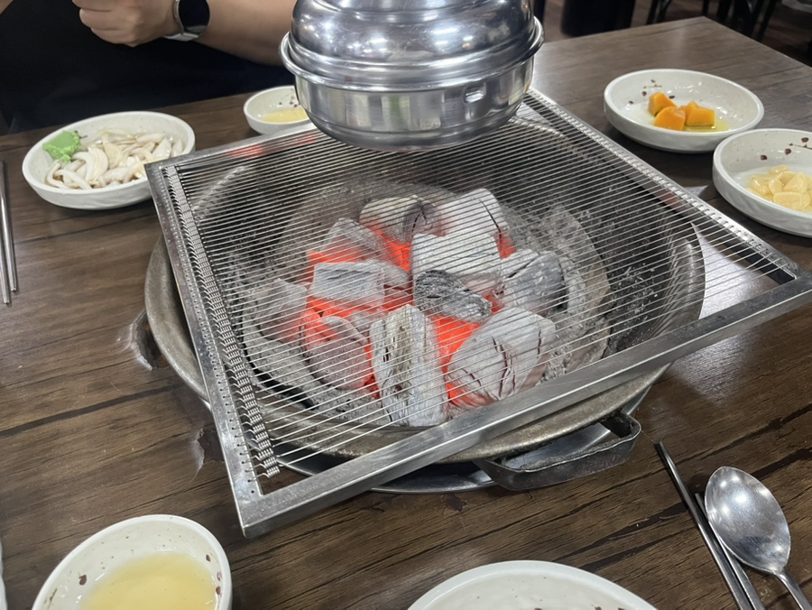 Glowing charcoal grill setup