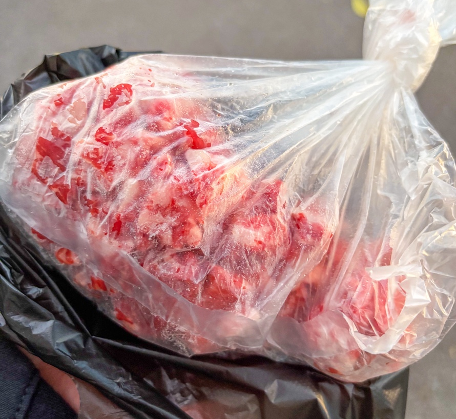 Complimentary bag of fresh beef trim given as a parting gift at Yeonchun