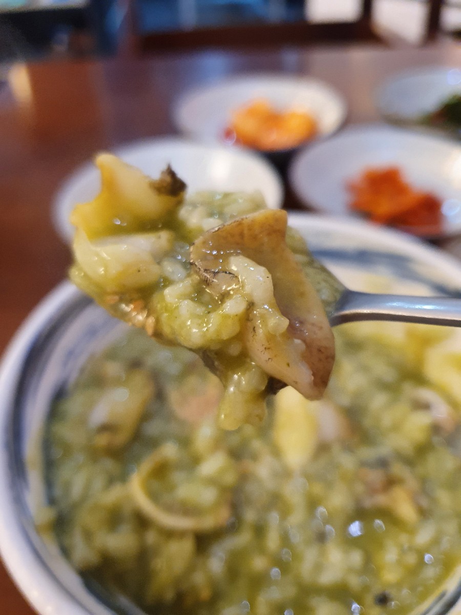 A spoonful of abalone porridge at Wonjo Jeonbokjuk