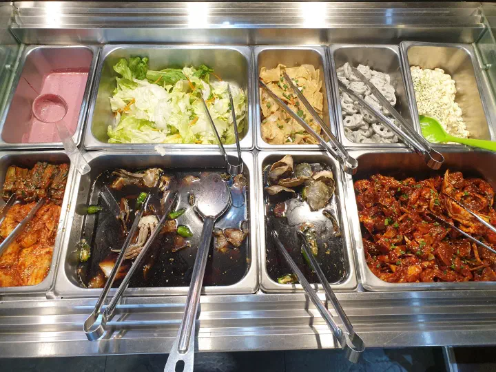 Self-service bar with unlimited soy and spicy marinated rock crab