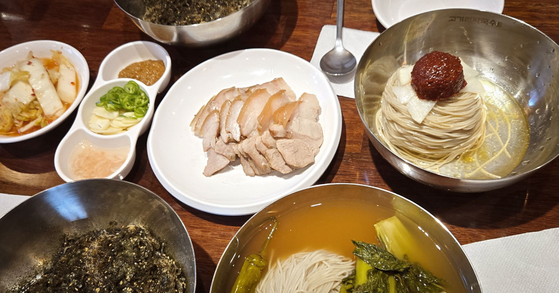 Perilla oil makguksu and boiled pork at Gogiri Makguksu