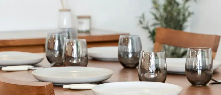 A dining table set for a simple meal at home