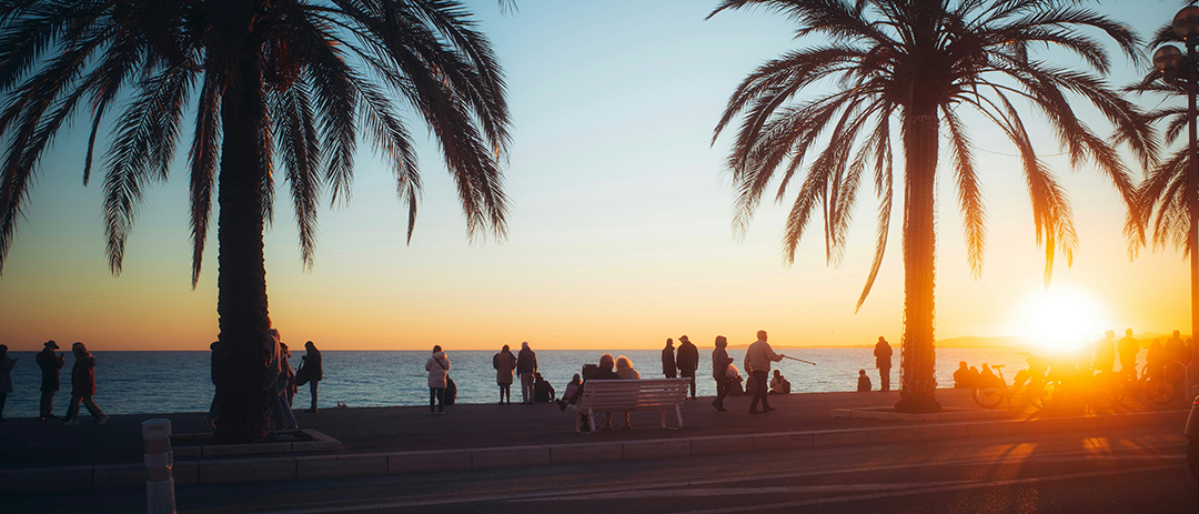 People walking together along a beach at sunset, symbolizing relationships and trust