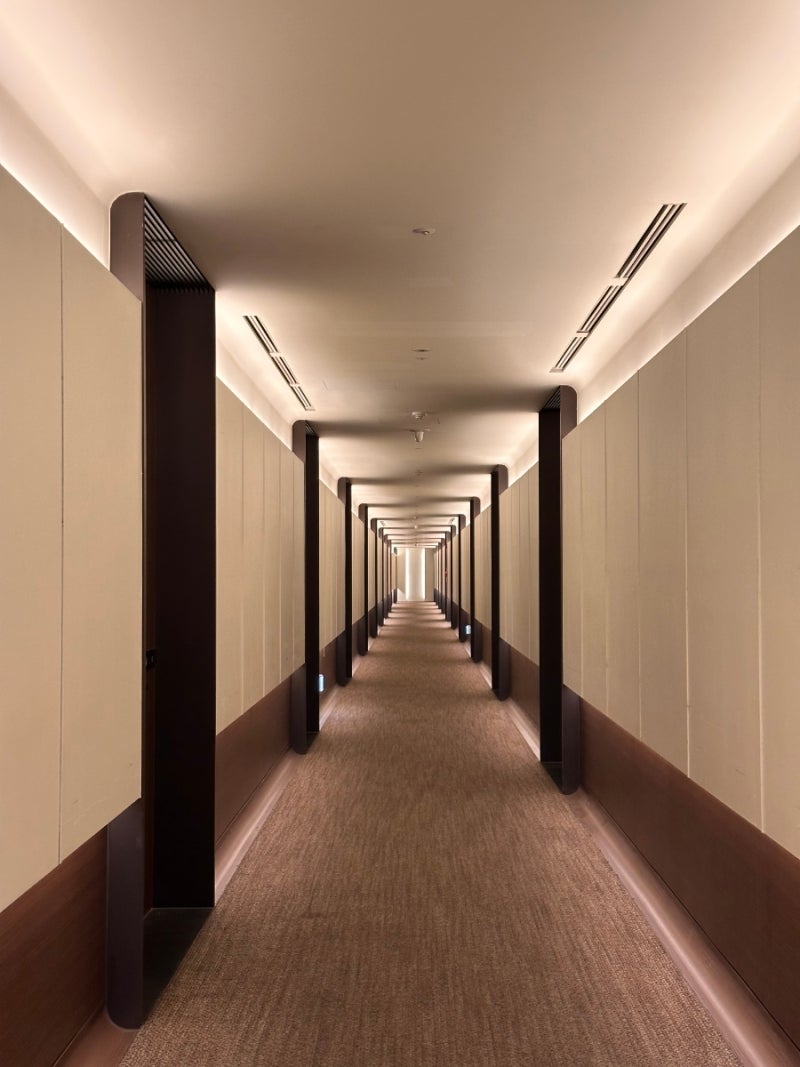 Long corridor leading to the guest rooms at Ananti Cove