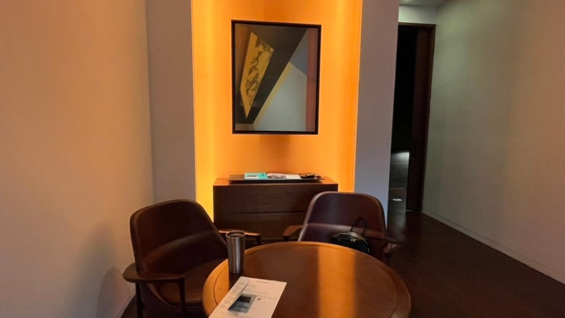 Premier Twin Room dining nook with framed art