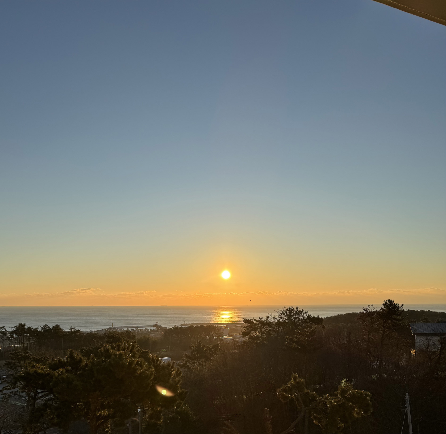 Sunrise over the Gijang sea from Villa de Himmel