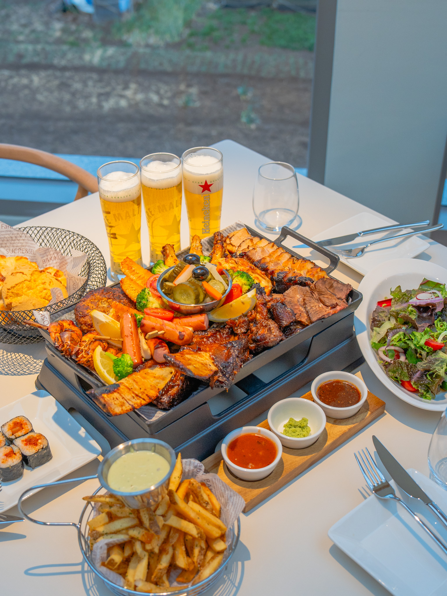 BBQ platter with draft beer at Ocean Bliss - dinner with sea view
