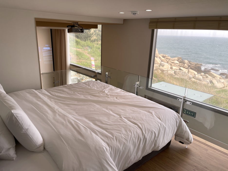 Master bedroom with ocean view at Ocean Bliss - upper floor of the pool villa