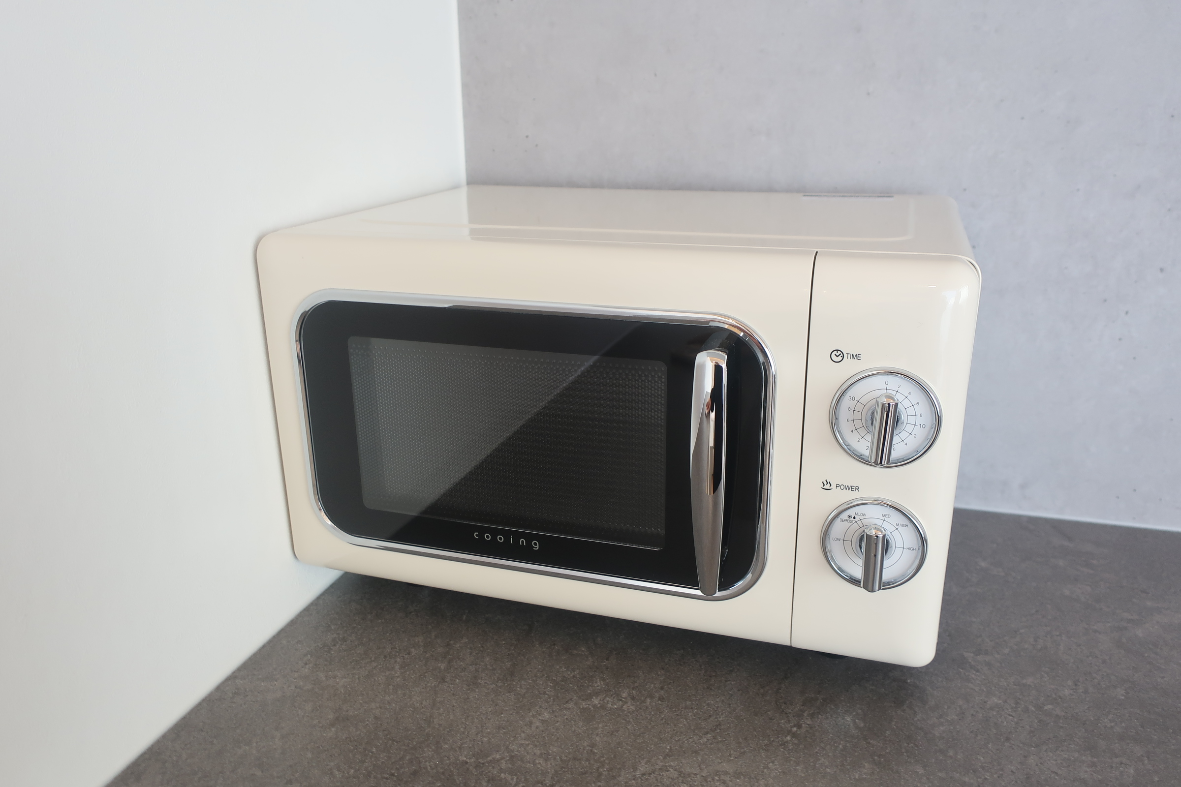 Mini kitchen with retro-style microwave and fridge at Ocean Bliss villa