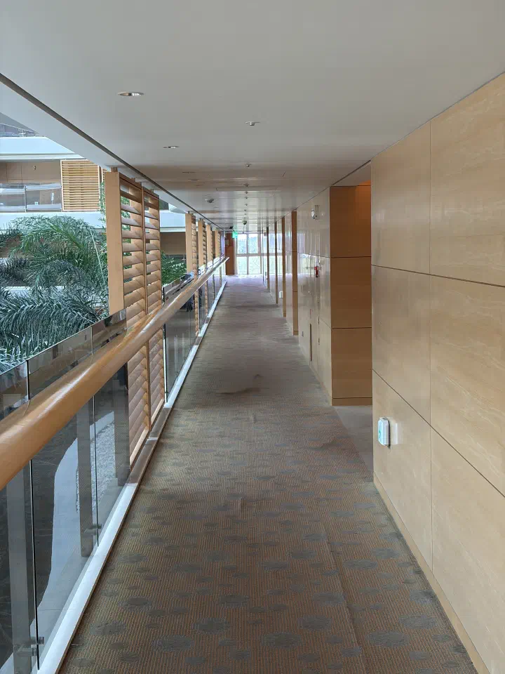 Indoor walkway connecting the hotel and resort wings at Haevichi Hotel & Resort Jeju