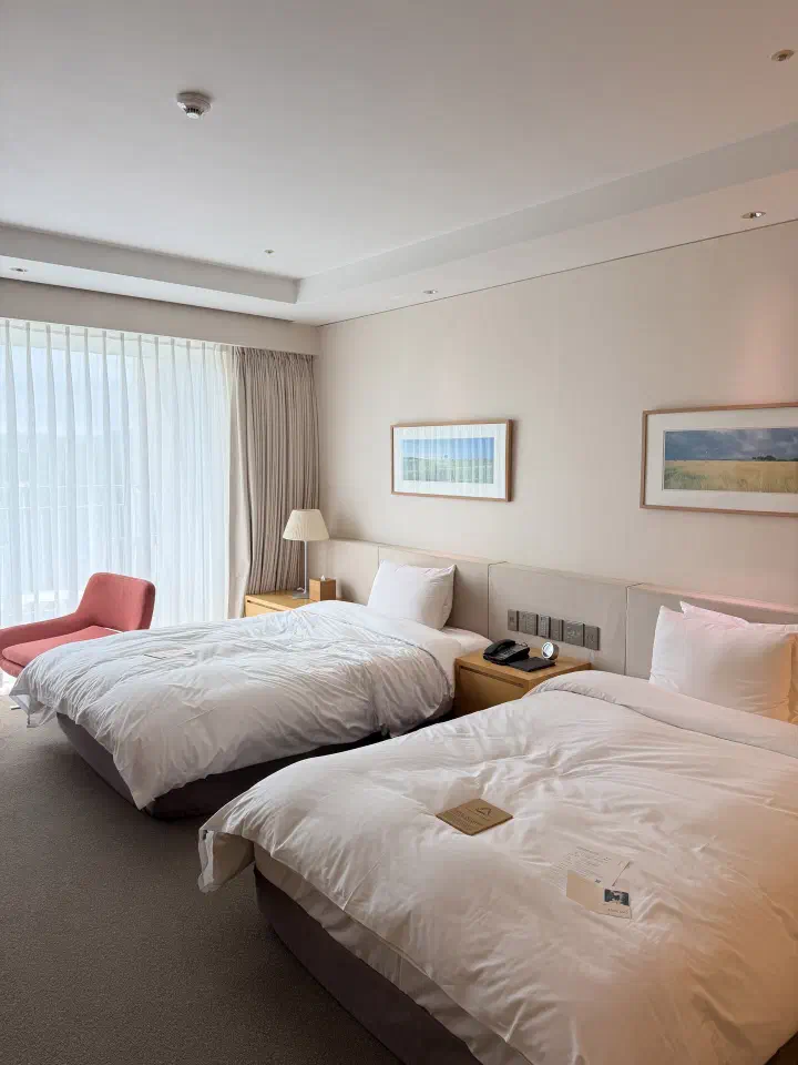 Twin-bed room at Haevichi Hotel Jeju, a handy layout for family stays